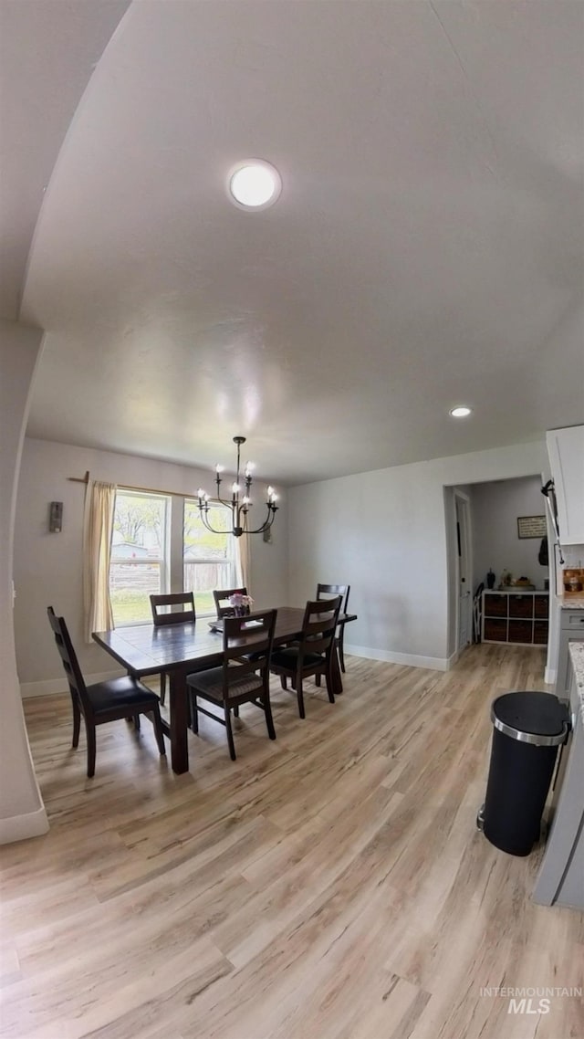 808 Adell Ave, Filer, ID 83328 - dining area featuring light wood-type flooring, recessed lighting, baseboards, and a chandelier