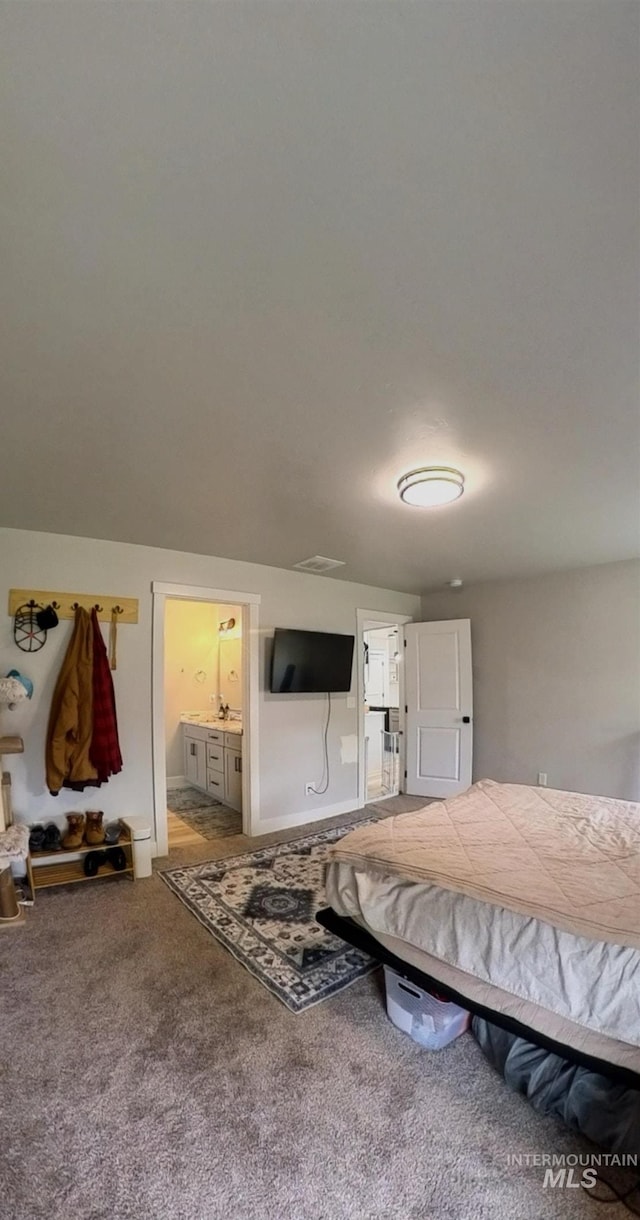 808 Adell Ave, Filer, ID 83328 - bedroom featuring carpet floors and ensuite bathroom