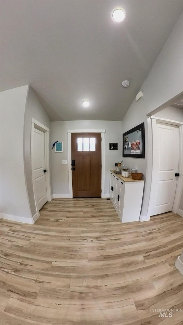 808 Adell Ave, Filer, ID 83328 - entryway with recessed lighting, baseboards, vaulted ceiling, and light wood-style flooring