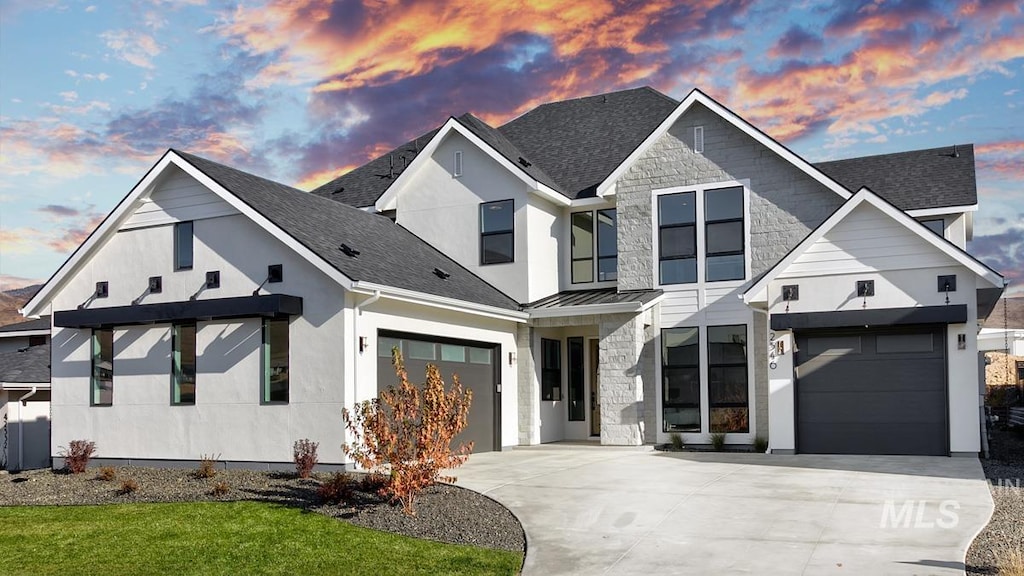 view of front of home with a garage