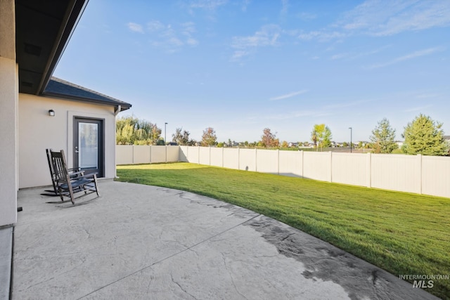 view of patio with a fenced backyard