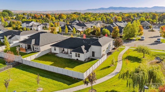 bird's eye view with a mountain view and a residential view