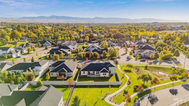 bird's eye view featuring a residential view and a mountain view