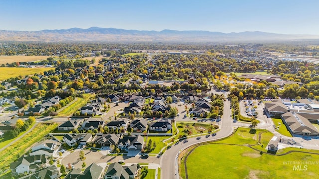 bird's eye view featuring a residential view and a mountain view