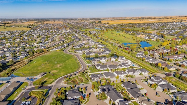 aerial view featuring a water view and a residential view