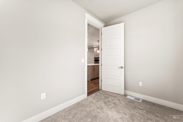 4469 E Wingate Ct, Nampa, ID 83687 - unfurnished room featuring light colored carpet and baseboards