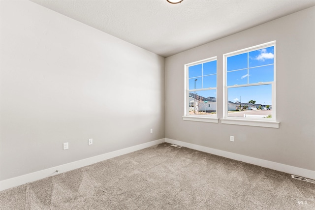 4469 E Wingate Ct, Nampa, ID 83687 - spare room with carpet and baseboards