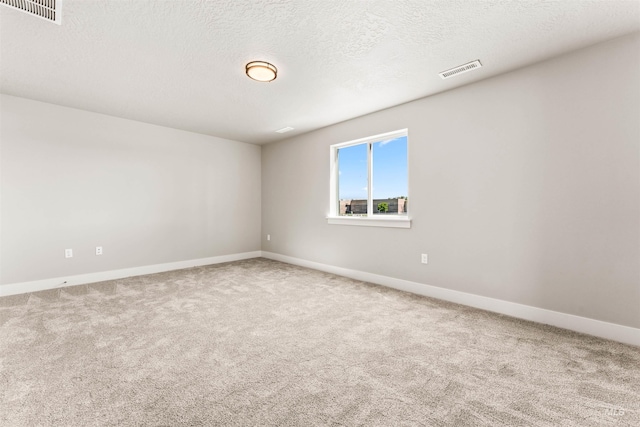 4469 E Wingate Ct, Nampa, ID 83687 - carpeted spare room featuring baseboards and a textured ceiling