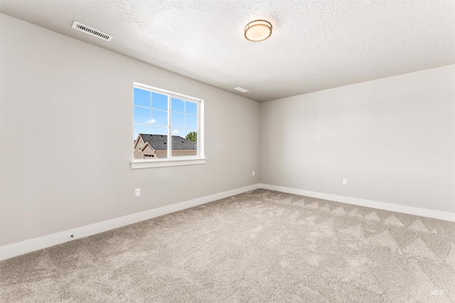 4469 E Wingate Ct, Nampa, ID 83687 - carpeted empty room with baseboards and a textured ceiling