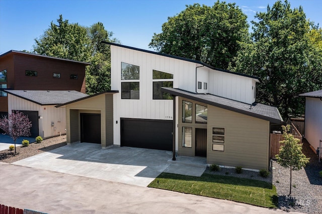 1796 S Eagleson Rd, Boise, ID 83705 - modern home featuring concrete driveway and an attached garage