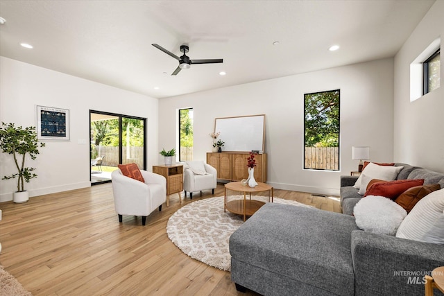 1796 S Eagleson Rd, Boise, ID 83705 - living area with light wood finished floors, recessed lighting, ceiling fan, and baseboards
