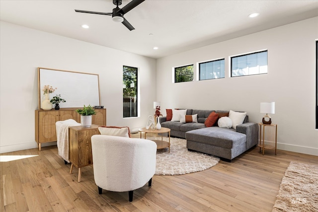 1796 S Eagleson Rd, Boise, ID 83705 - living area featuring a ceiling fan, recessed lighting, light wood-style floors, and baseboards
