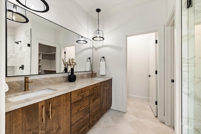 1796 S Eagleson Rd, Boise, ID 83705 - full bath featuring double vanity, a marble finish shower, a walk in closet, and baseboards