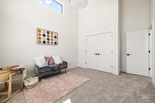 1796 S Eagleson Rd, Boise, ID 83705 - sitting room with a towering ceiling, carpet flooring, and baseboards