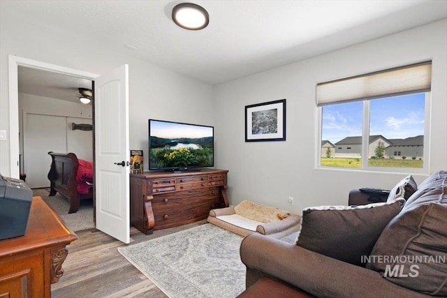 living area with light wood-style floors