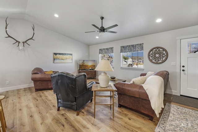 1317 Kyla Ct, Jerome, ID 83338 - living room featuring ceiling fan, lofted ceiling, light wood-style floors, recessed lighting, and baseboards