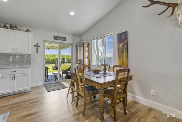 1317 Kyla Ct, Jerome, ID 83338 - dining space with lofted ceiling, baseboards, light wood-style flooring, and recessed lighting
