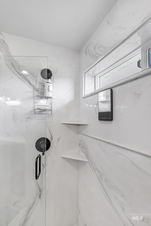 1317 Kyla Ct, Jerome, ID 83338 - bathroom featuring a marble finish shower