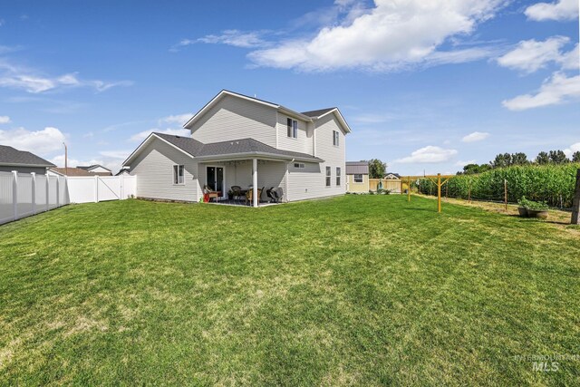 1317 Kyla Ct, Jerome, ID 83338 - rear view of house with a patio area