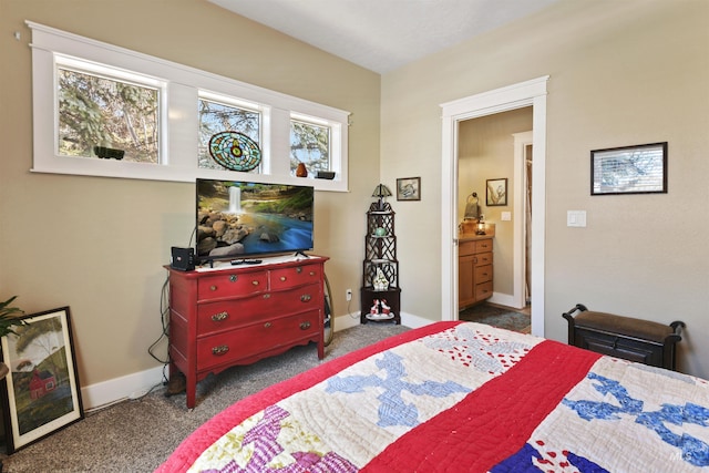 carpeted bedroom with baseboards