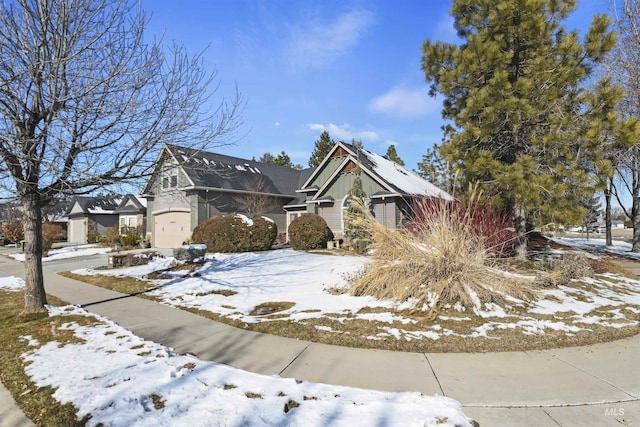 view of front of house with an attached garage and driveway