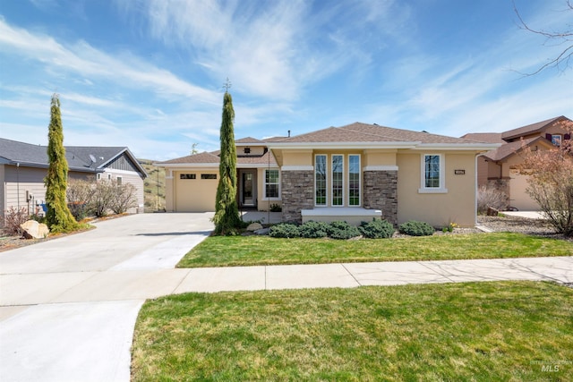view of front facade with a front lawn, stucco siding, driveway, stone siding, and a garage