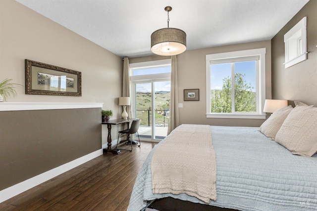 bedroom with baseboards, access to outside, and dark wood finished floors