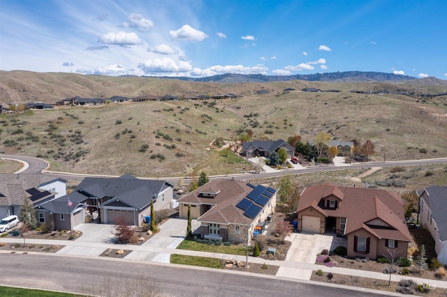 birds eye view of property featuring a residential view and a mountain view