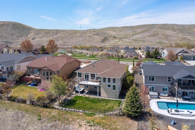 aerial view featuring a mountain view and a residential view