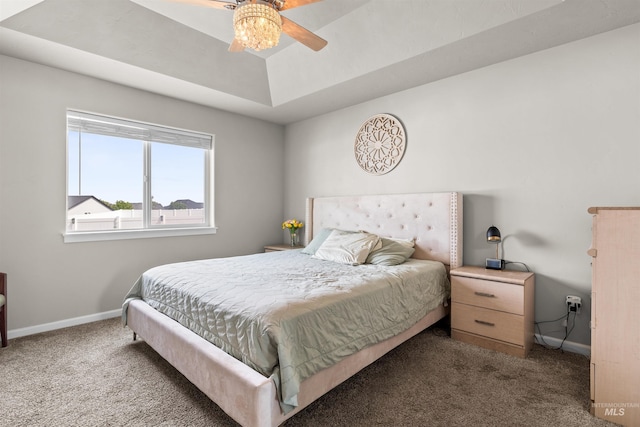 847 Bridget St, Twin Falls, ID 83301 - bedroom with carpet, baseboards, a tray ceiling, and ceiling fan