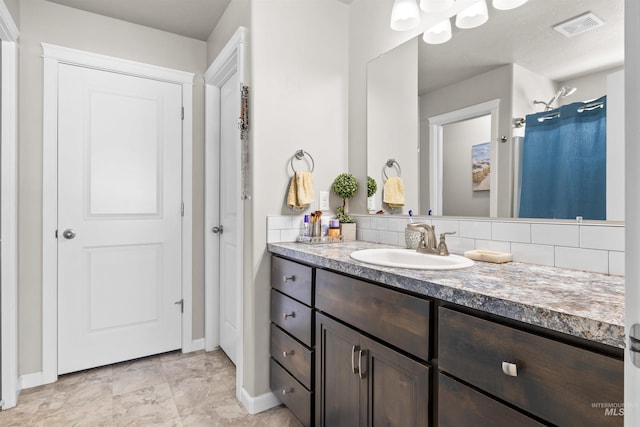 847 Bridget St, Twin Falls, ID 83301 - full bath with vanity, baseboards, and a shower with curtain