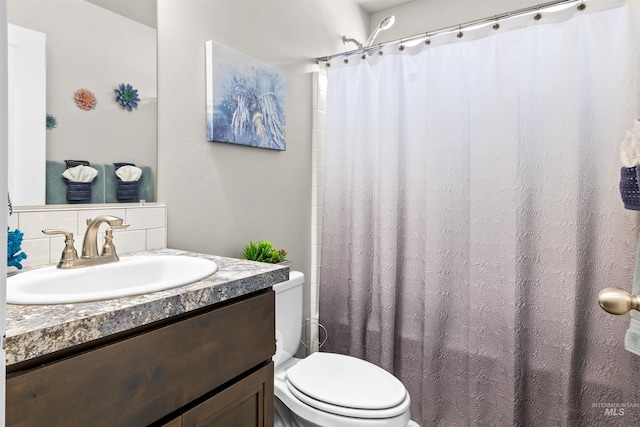 847 Bridget St, Twin Falls, ID 83301 - bathroom with toilet, vanity, and curtained shower