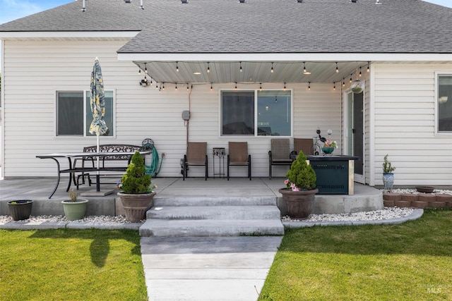 847 Bridget St, Twin Falls, ID 83301 - back of house featuring a shingled roof, a patio, and a yard