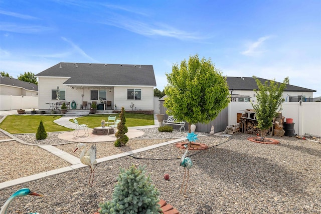 847 Bridget St, Twin Falls, ID 83301 - back of property featuring a patio and an outbuilding