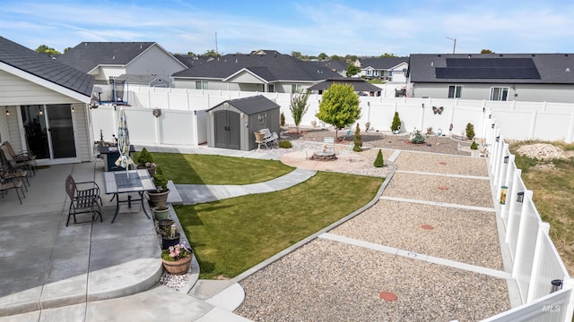 847 Bridget St, Twin Falls, ID 83301 - view of yard with a patio area, a garden, and a residential view