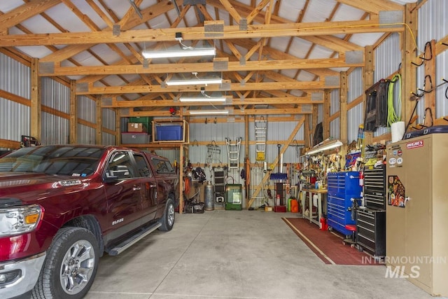 garage with a workshop area