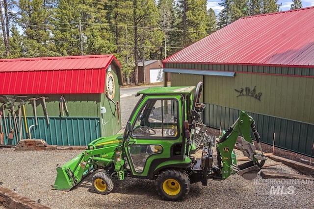 exterior space with a storage unit and an outdoor structure