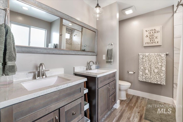 4076 N 3446 E, Kimberly, ID 83341 - full bath featuring wood finished floors, two vanities, and a shower