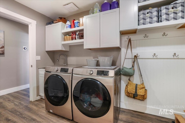 4076 N 3446 E, Kimberly, ID 83341 - laundry area with washer and clothes dryer, cabinet space, and wood finished floors