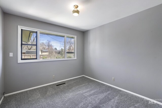 620 Monte Vista Dr, Twin Falls, ID 83301 - carpeted empty room with visible vents and baseboards