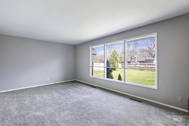 620 Monte Vista Dr, Twin Falls, ID 83301 - carpeted empty room featuring visible vents and baseboards