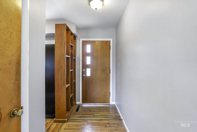 620 Monte Vista Dr, Twin Falls, ID 83301 - doorway with wood finished floors and baseboards