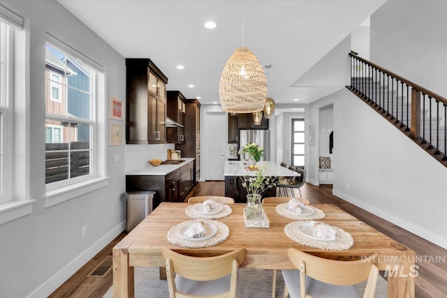 2959 S Shady Ln, Boise, ID 83716 - dining space featuring baseboards, stairs, dark wood-style flooring, and recessed lighting