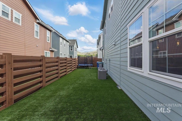 2959 S Shady Ln, Boise, ID 83716 - view of yard with a trampoline, a residential view, and central AC unit