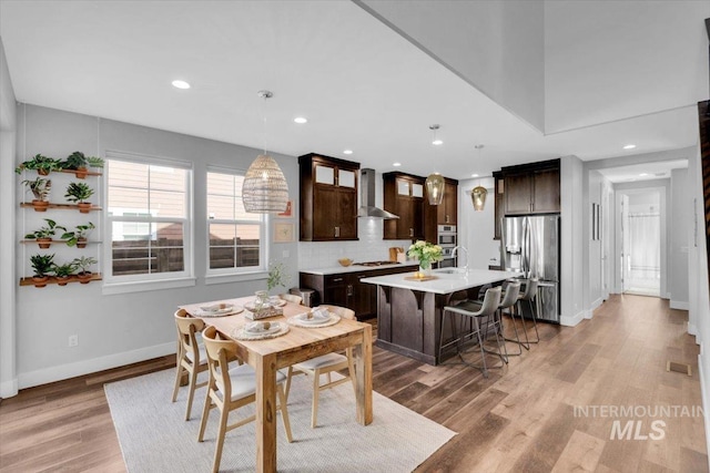 2959 S Shady Ln, Boise, ID 83716 - dining area featuring baseboards, recessed lighting, and light wood finished floors
