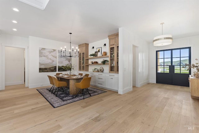 11950 W Lanktree Gulch Rd, Star, ID 83669 - dining space featuring light wood-type flooring, recessed lighting, and a chandelier