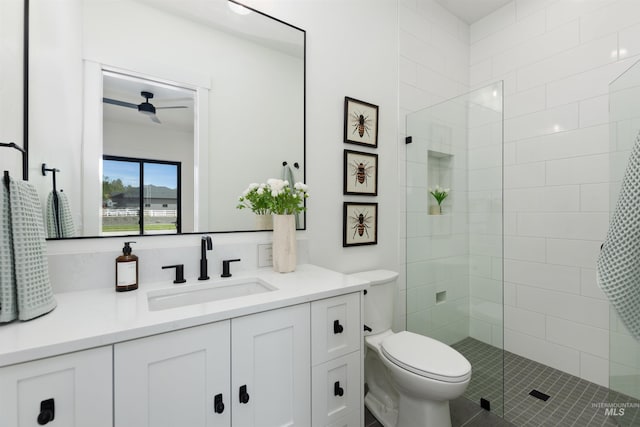 11950 W Lanktree Gulch Rd, Star, ID 83669 - bathroom with a tile shower, vanity, and a ceiling fan