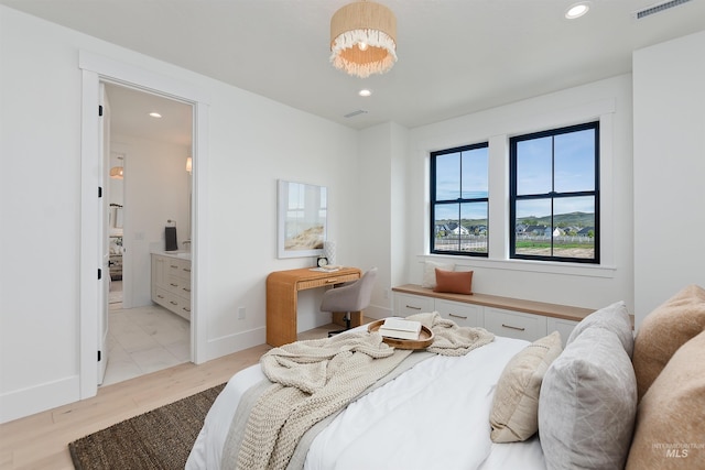 11950 W Lanktree Gulch Rd, Star, ID 83669 - bedroom featuring recessed lighting, light wood-style floors, and ensuite bath