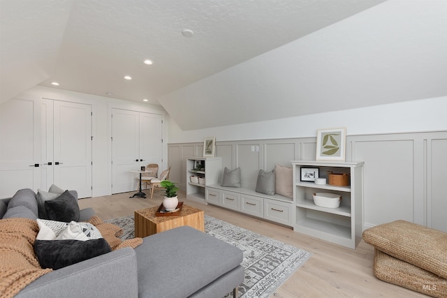11950 W Lanktree Gulch Rd, Star, ID 83669 - living room with light wood-style flooring, recessed lighting, and vaulted ceiling