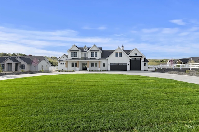 11950 W Lanktree Gulch Rd, Star, ID 83669 - modern farmhouse with driveway, covered porch, board and batten siding, a standing seam roof, and a metal roof